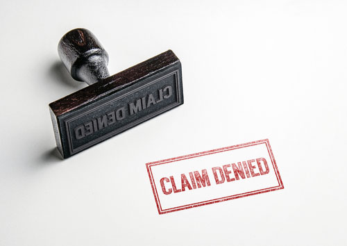 The words claim denied stamped in red