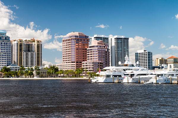 West Palm Beach Florida skyline view with boat