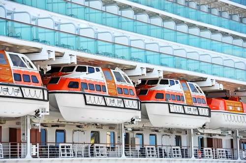 Lifeboats on deck of a cruise ship, concept of cruise ship accident lawyer