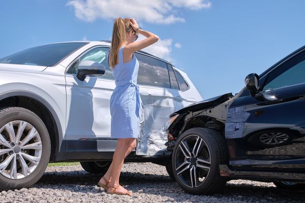 A woman after a crash that needs to call a Car Accident Lawyer in Boca Raton