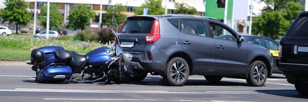 A motorcycle hitting a car of someone that needs to call a motorcycle accident lawyer in boca raton