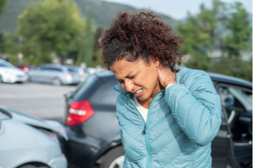 A woman with neck pain from a rear-end accident